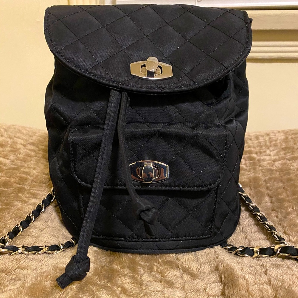 Forever 21 black mini quilted backpack with drawstring.